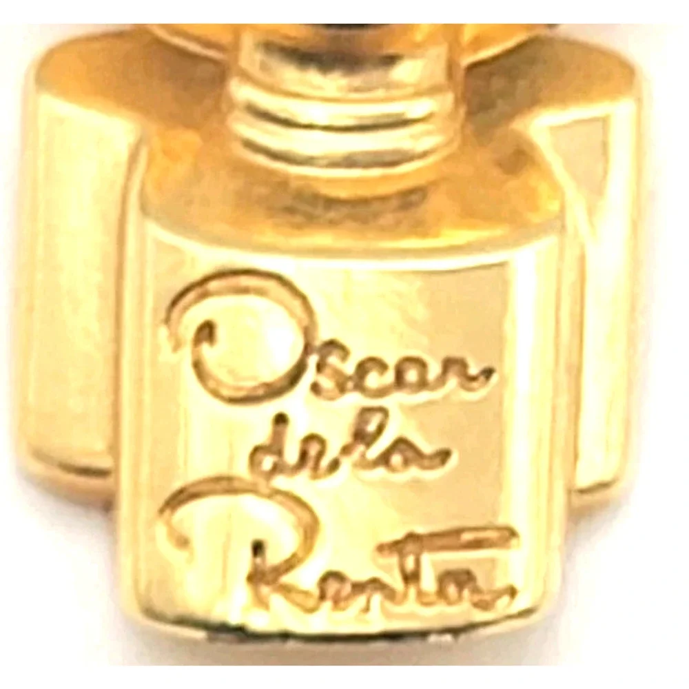 Oscar de la Renta Perfume Bottle Gold Tone Designer Fragrance Advertising Pin